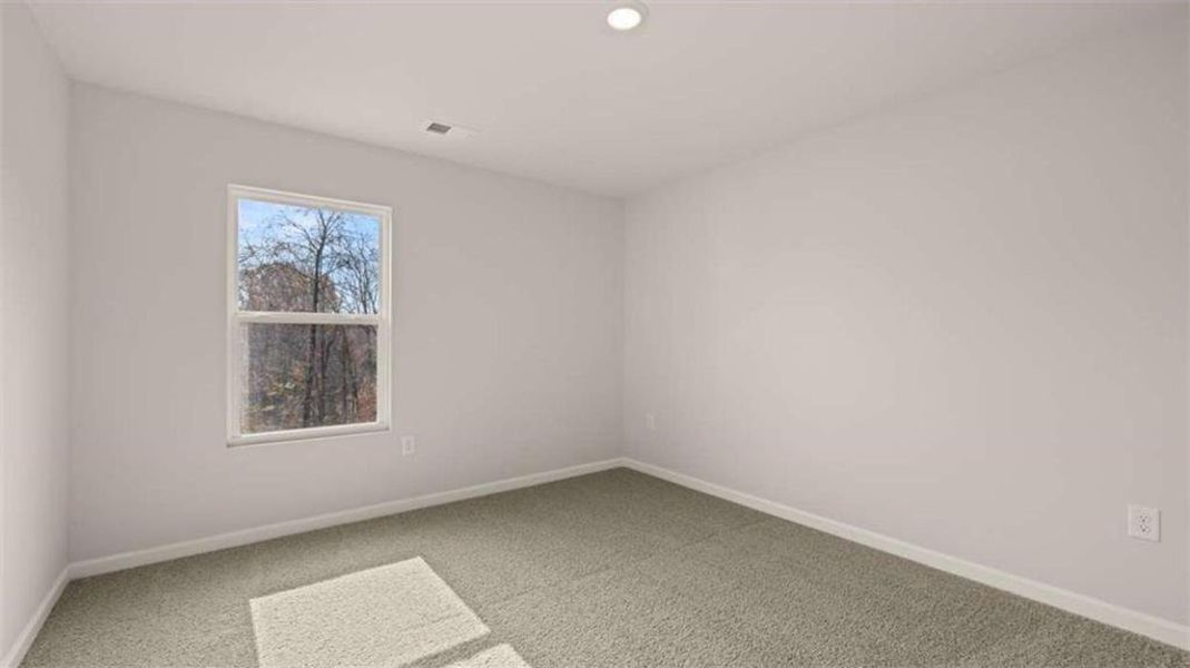 Spacious, unfurnished interior of a new home in The Reserve at Calcutta, Stockbridge (Image 13).