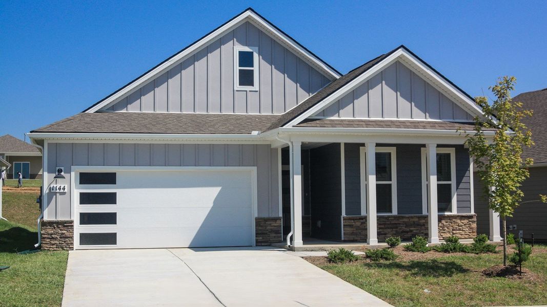 Front exterior of a new home in Nexus South, Gallatin, TN, highlighting curb appeal (Image 1). Front exterior of a new home in Nexus South, Gallatin, TN, highlighting curb appeal (Image 1).