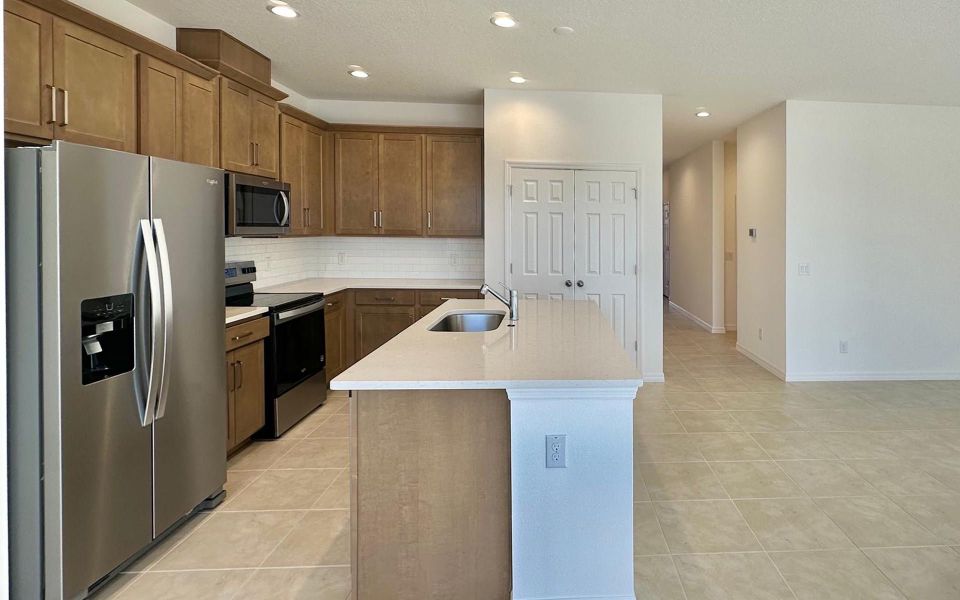 Furnished interior view inside a new home in Trinity Place, St. Cloud (Image 6). Furnished interior view inside a new home in Trinity Place, St. Cloud (Image 6).