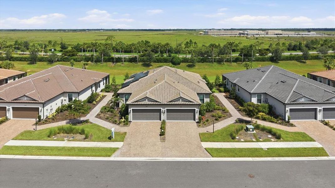 Front exterior of a new home in , Sarasota, FL, highlighting curb appeal (Image 20). Front exterior of a new home in , Sarasota, FL, highlighting curb appeal (Image 20).