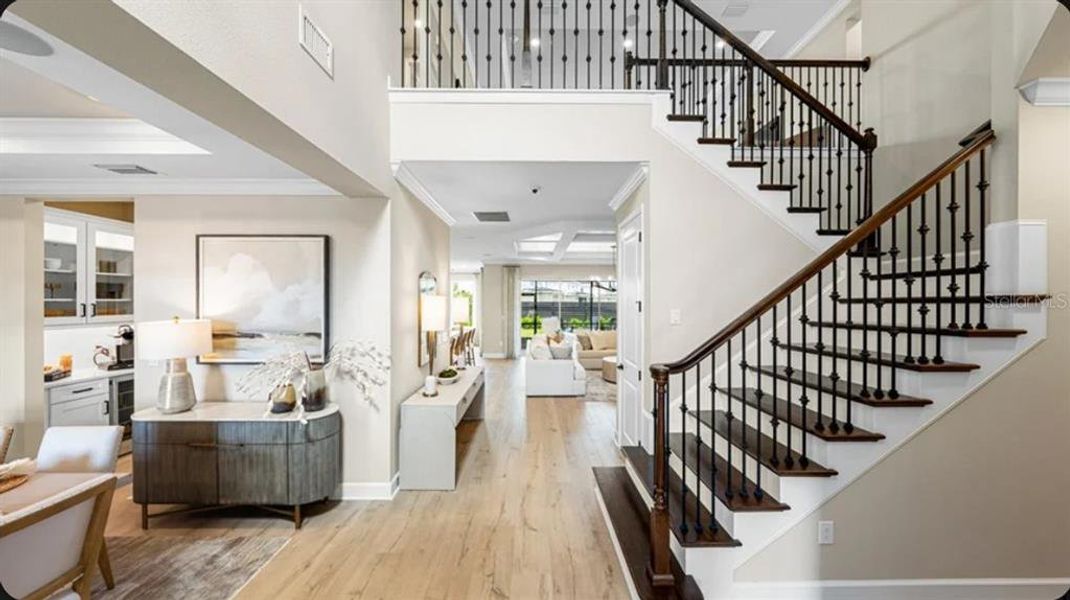 Furnished interior view inside a new home in Coasterra Community Group Page, Palmetto (Image 10).