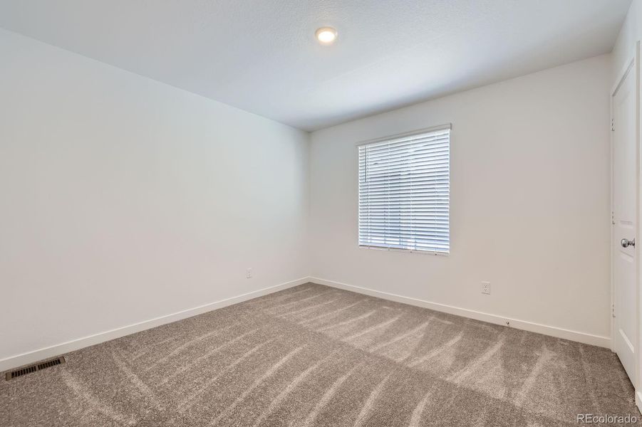 Spacious, unfurnished interior of a new home in Copper Chase: The Celestial Collection, Colorado Springs (Image 12).