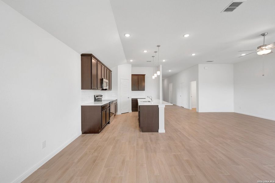 Furnished interior view inside a new home in Chaparral Ranch, Floresville (Image 4).