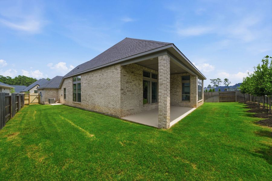 Exterior details and patio area of a home in Audubon 60′, Magnolia (Image 25).