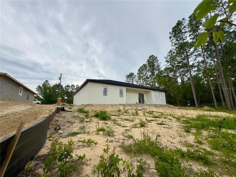 Front exterior of a new home in , Citrus Springs, FL, highlighting curb appeal (Image 15).