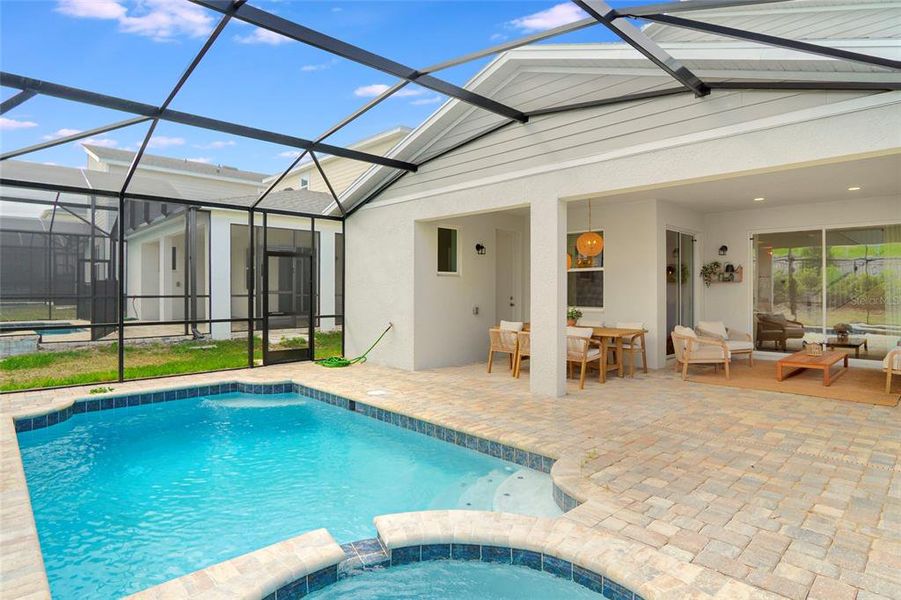 Exterior details and patio area of a home in Solara Resort, Kissimmee (Image 24).