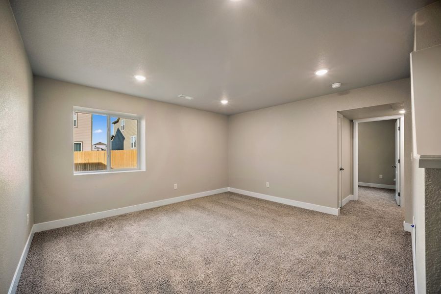 Spacious, unfurnished interior of a new home in Ridge at Lorson Ranch, Colorado Springs (Image 32).