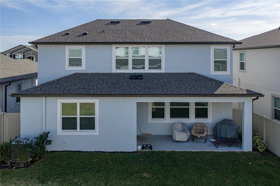 Exterior details and patio area of a home in Epperson, Wesley Chapel (Image 29).