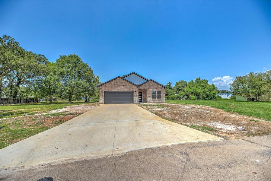 Front exterior of a new home in , Livingston, TX, highlighting curb appeal (Image 2). Front exterior of a new home in , Livingston, TX, highlighting curb appeal (Image 2).
