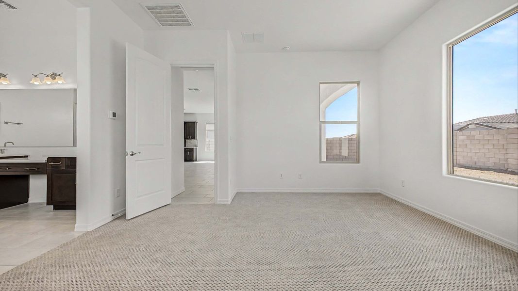 Furnished interior view inside a new home in Arroyo Seco - Hacienda, Buckeye (Image 14).