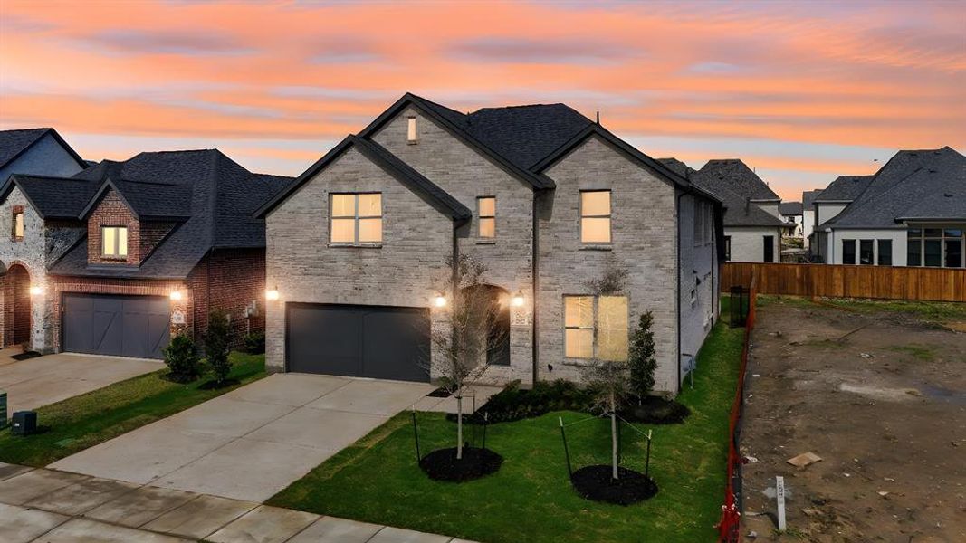 Front exterior of a new home in Brookhollow West, Prosper, TX, highlighting curb appeal (Image 27). Front exterior of a new home in Brookhollow West, Prosper, TX, highlighting curb appeal (Image 27).
