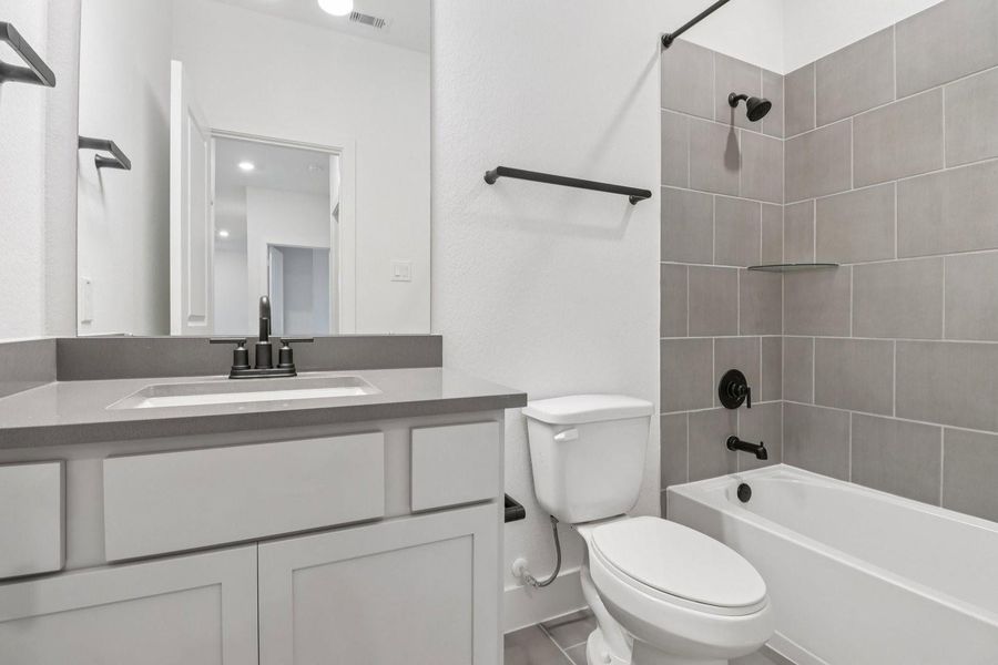 Furnished interior view inside a new home in The Residences Collection at Oakberry Trails, Waller (Image 11).