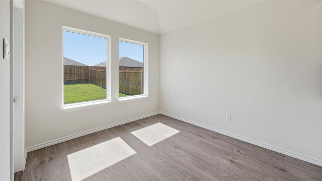 Empty room with wood finished floors