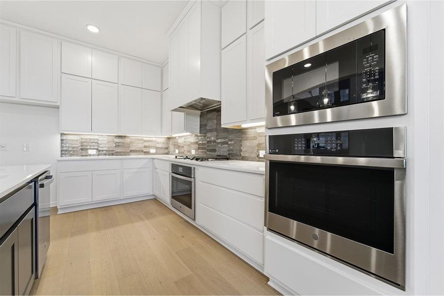 Furnished interior view inside a new home in Green Meadows, Celina (Image 6).
