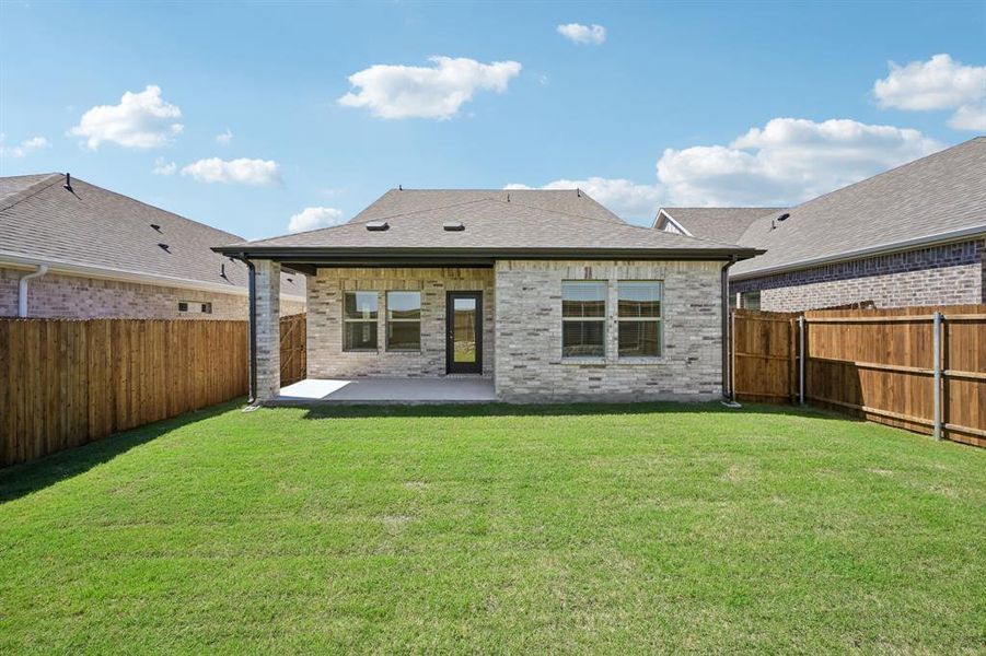 Exterior details and patio area of a home in Parks at Foster Crossing - Spring Series, Anna (Image 21).