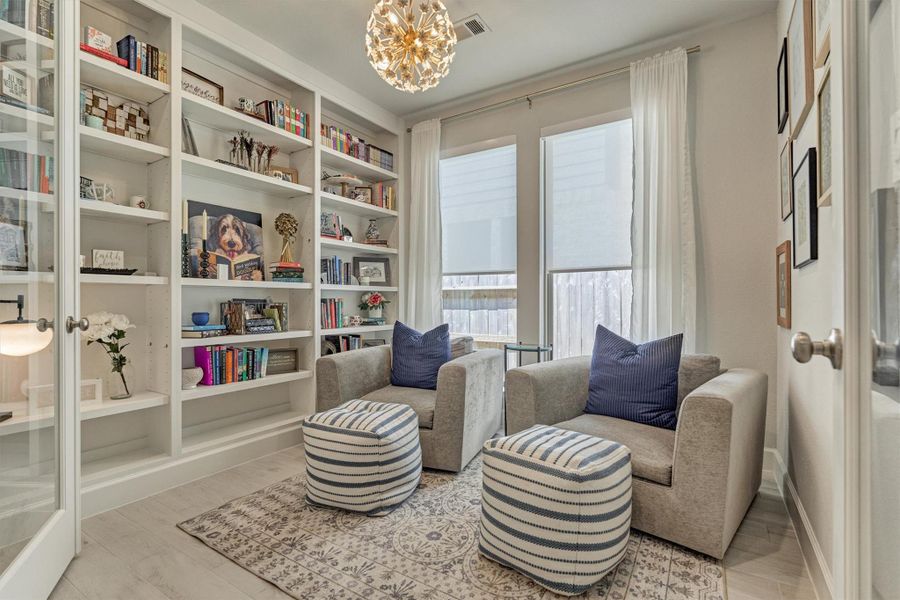 Rare Perry floor plan with a home office or optional 4th bedroom!  Wonderful custom built adjustable shelf library wall, porcelain sphere chandlier, double French door entry.