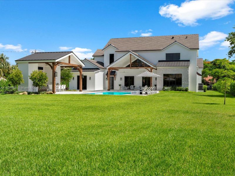 Front exterior of a new home in , Miami, FL, highlighting curb appeal (Image 27).