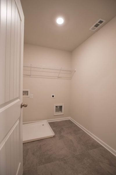 Representative unfurnished interior of a home built from the Rutherford by Piedmont Residential in Owen Preserve, Canton (Image 10).