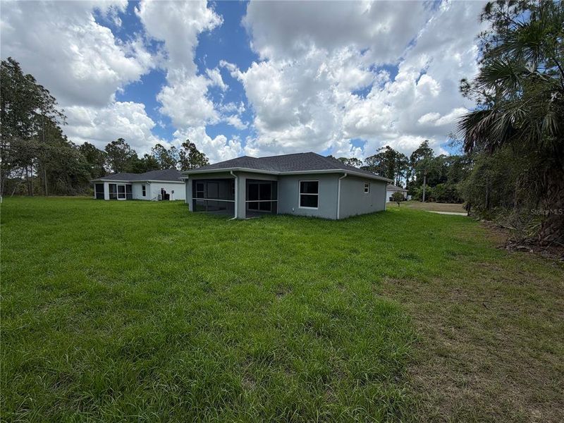 Exterior details and patio area of a home in , North Port (Image 20).