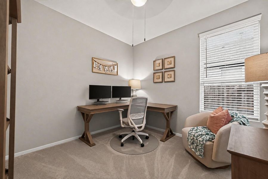 Versatile bedroom currently arranged as a home office and sitting area. Versatile bedroom currently arranged as a home office and sitting area.