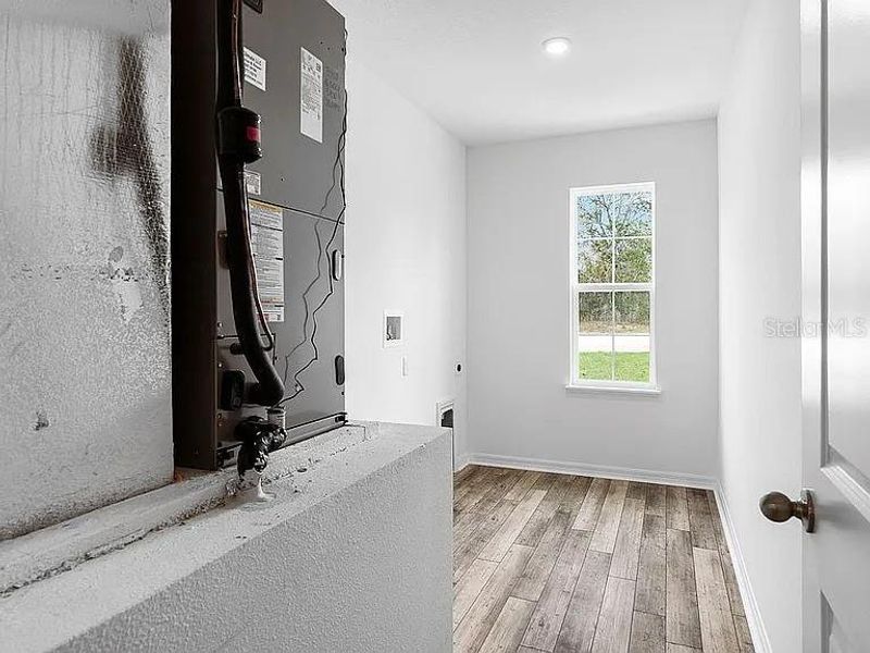 Spacious, unfurnished interior of a new home in Royal Highlands, Brooksville (Image 38).