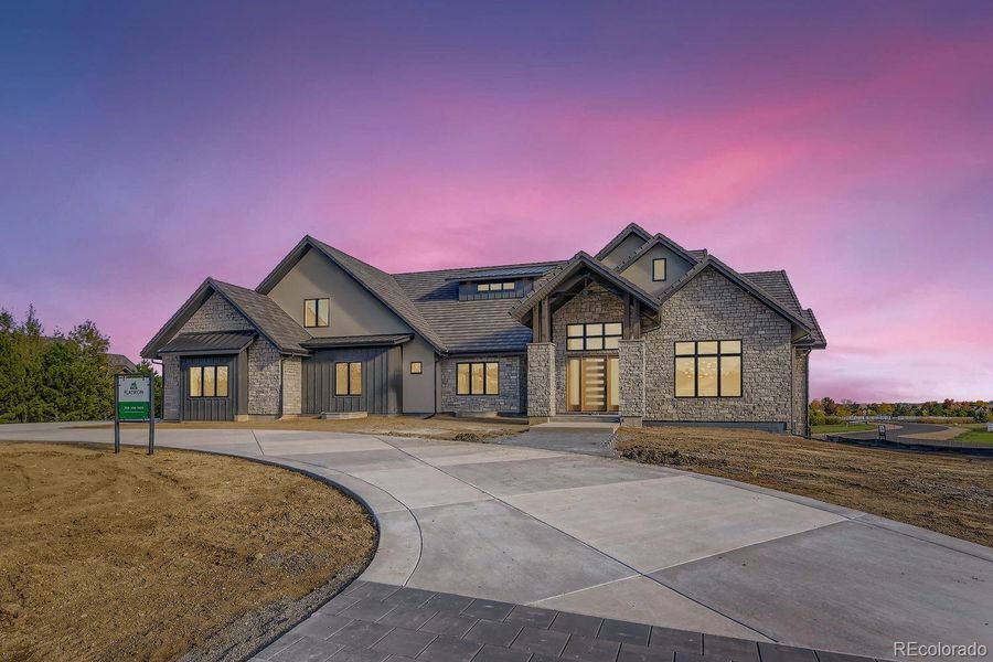 Front exterior of a new home in , Broomfield, CO, highlighting curb appeal (Image 2). Front exterior of a new home in , Broomfield, CO, highlighting curb appeal (Image 2).