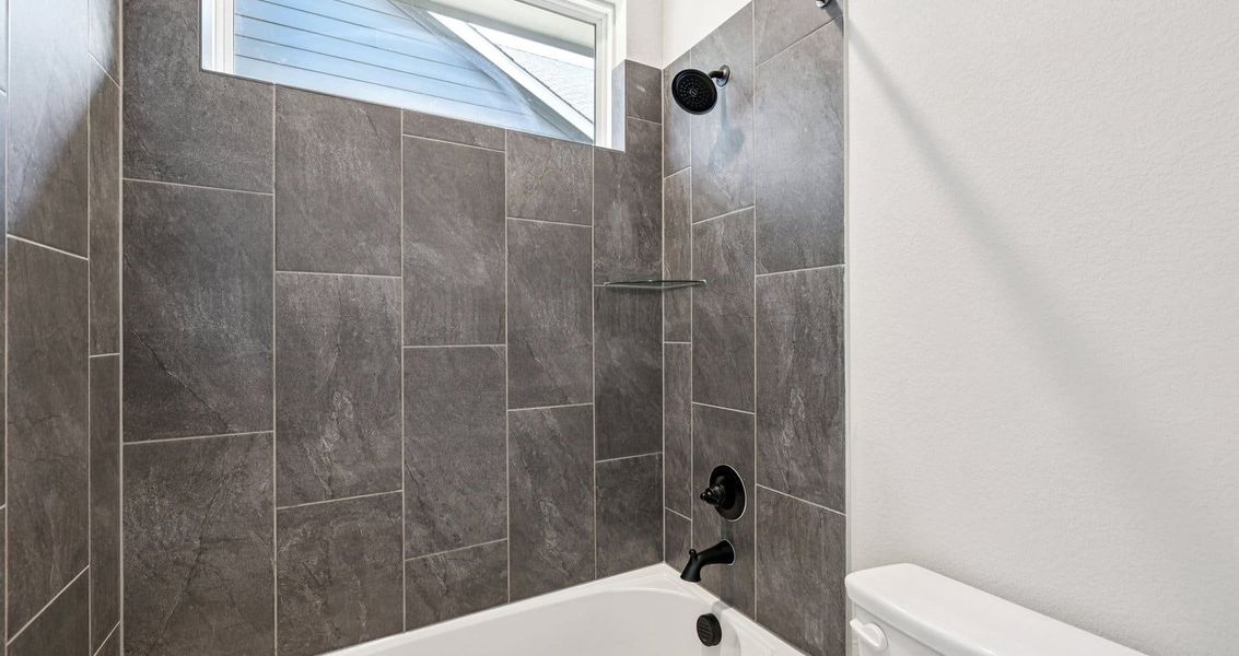 Furnished interior view inside a new home in Trace, San Marcos (Image 16).