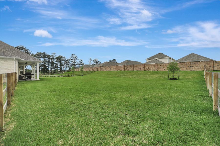 Exterior details and patio area of a home in Lone Star Landing, Montgomery (Image 25).