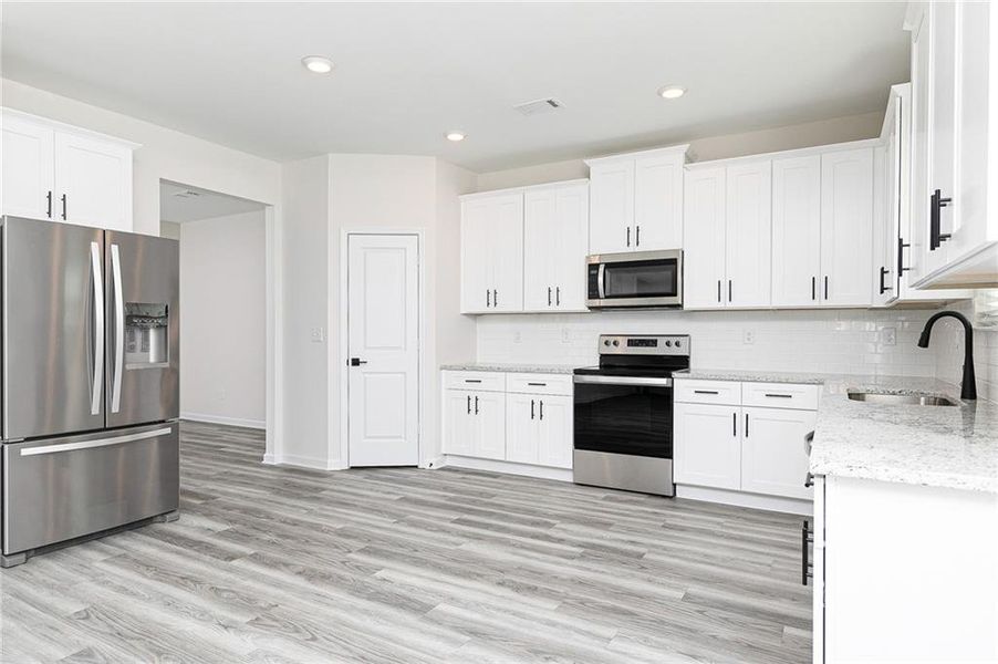 Furnished interior in a model home at Lake Preserve at Jackson Trail in Hoschton (Image 3). Furnished interior in a model home at Lake Preserve at Jackson Trail in Hoschton (Image 3).