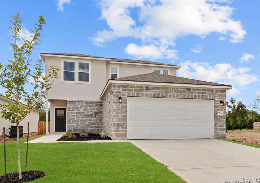 Front exterior of a new home in August Fields, New Braunfels, TX, highlighting curb appeal (Image 23). Front exterior of a new home in August Fields, New Braunfels, TX, highlighting curb appeal (Image 23).