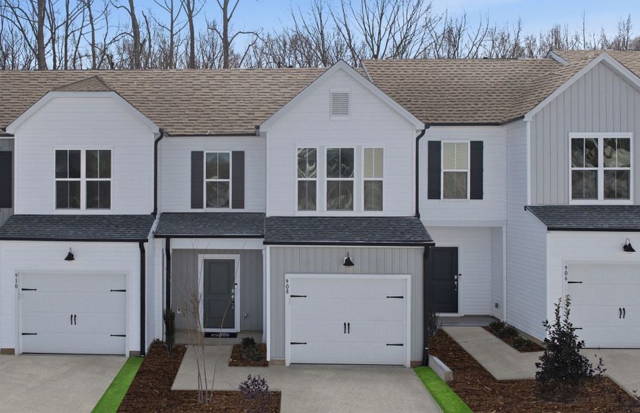 Front exterior of a new home in Flemingfield, Greensboro, NC, highlighting curb appeal (Image 26).