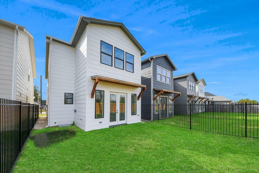 Exterior details and patio area of a home in , Houston (Image 4).