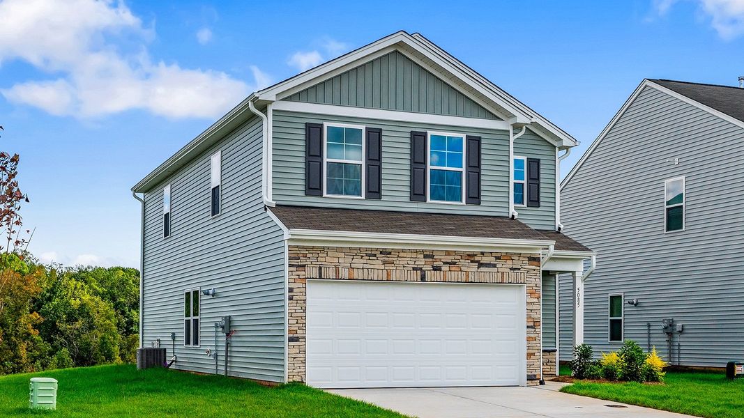 Front exterior of a new home in Bell West, Kernersville, NC, highlighting curb appeal (Image 24).