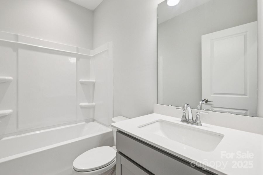 Furnished interior view inside a new home in Walk23, Huntersville (Image 14).