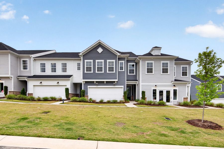 Front exterior of a new home in Millstone, Cramerton, NC, highlighting curb appeal (Image 1). Front exterior of a new home in Millstone, Cramerton, NC, highlighting curb appeal (Image 1).