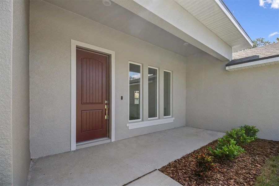 Exterior details and patio area of a home in , Palm Coast (Image 20).