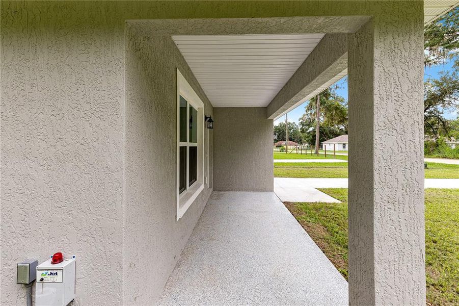 Exterior details and patio area of a home in , Summerfield (Image 2).