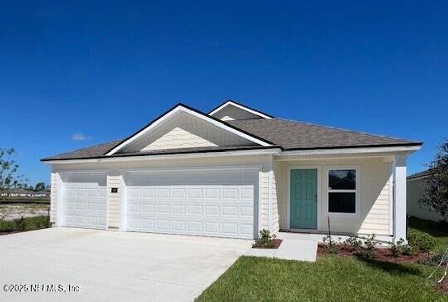 Front exterior of a new home in Sawmill Branch Express, Palm Coast, FL, highlighting curb appeal (Image 2). Front exterior of a new home in Sawmill Branch Express, Palm Coast, FL, highlighting curb appeal (Image 2).