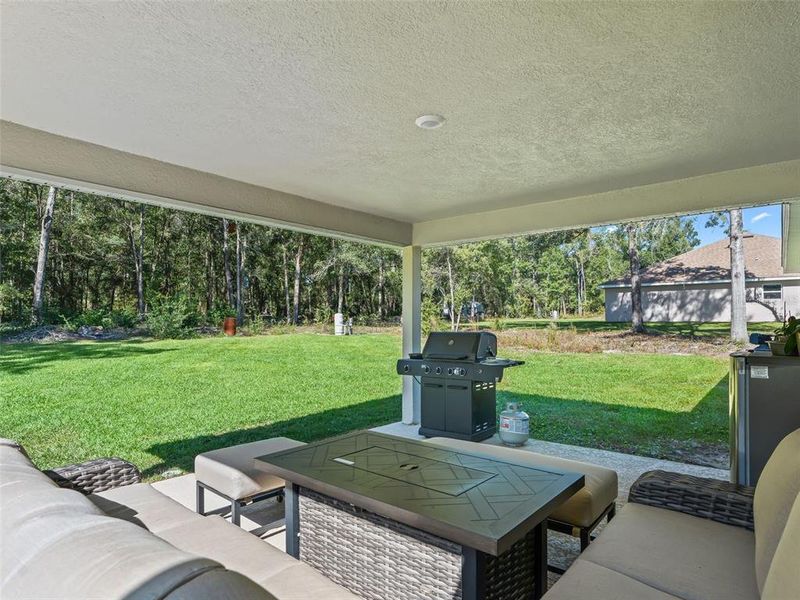 Exterior details and patio area of a home in Dorchester, Ocala (Image 25).