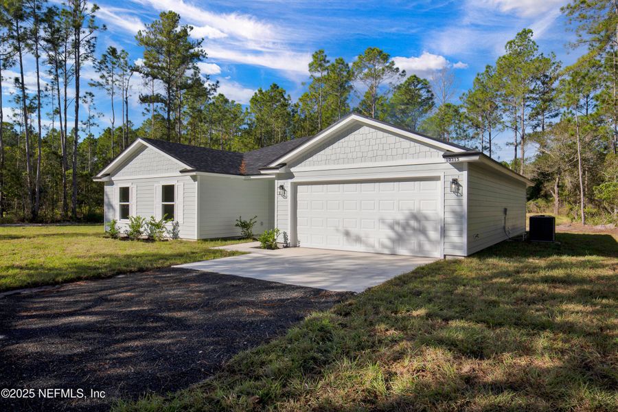 Front exterior of a new home in , Hastings, FL, highlighting curb appeal (Image 2). Front exterior of a new home in , Hastings, FL, highlighting curb appeal (Image 2).