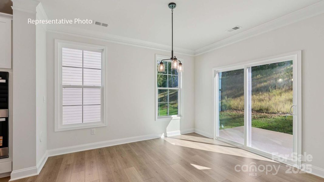Spacious, unfurnished interior of a new home in Sanctuary at Southgate, Indian Trail (Image 20).