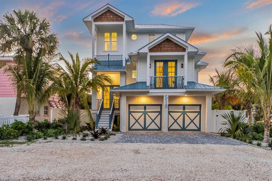 Front exterior of a new home in , Anna Maria, FL, highlighting curb appeal (Image 22).