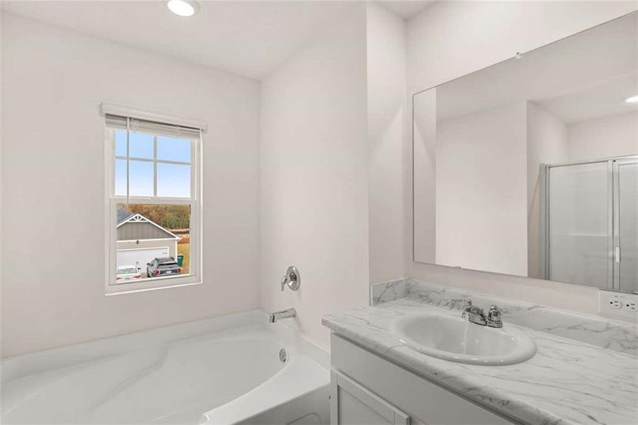 Furnished interior view inside a new home in Champion's Run, Lithonia (Image 4).