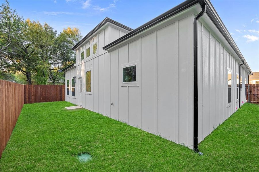 View of home's exterior featuring a lawn