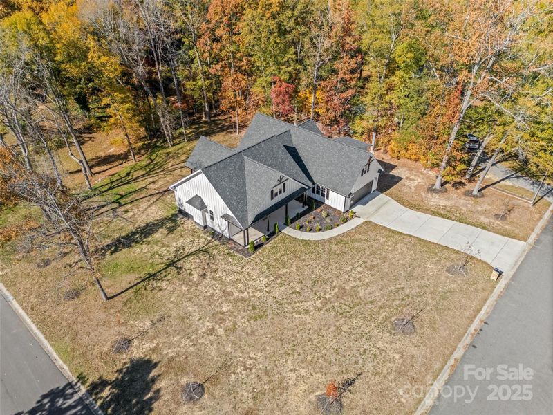 Front exterior of a new home in , Charlotte, NC, highlighting curb appeal (Image 27).