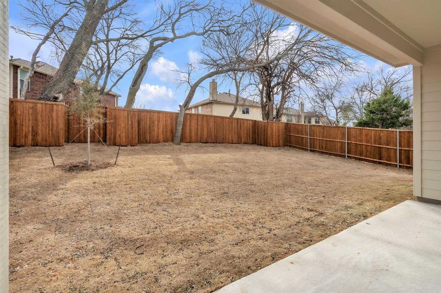 Exterior details and patio area of a home in The Landing at Hidden Lakes, McKinney (Image 22).