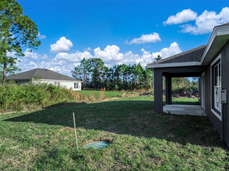 Exterior details and patio area of a home in , Sebring (Image 4).