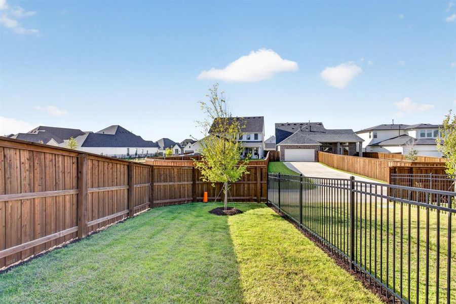 Fur babies? Little ones? This perfect patch of yard gives you your own green space while still being so low maintenance. Fur babies? Little ones? This perfect patch of yard gives you your own green space while still being so low maintenance.