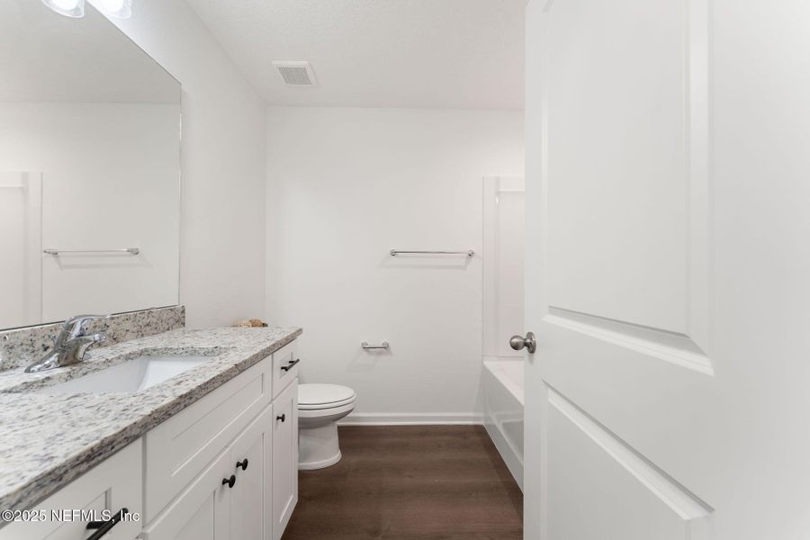 Furnished interior view inside a new home in , Green Cove Springs (Image 39).