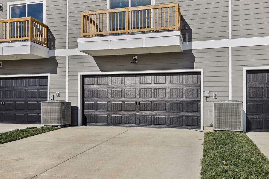 Exterior details and patio area of a home in Greystone - Highland Townhomes, Smyrna (Image 3).